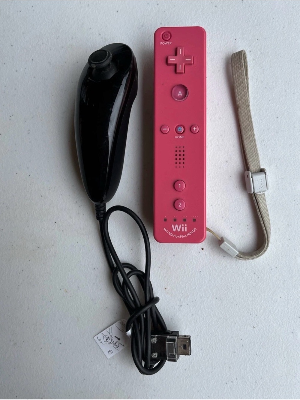 Nintendo Wii remote controller in Pink